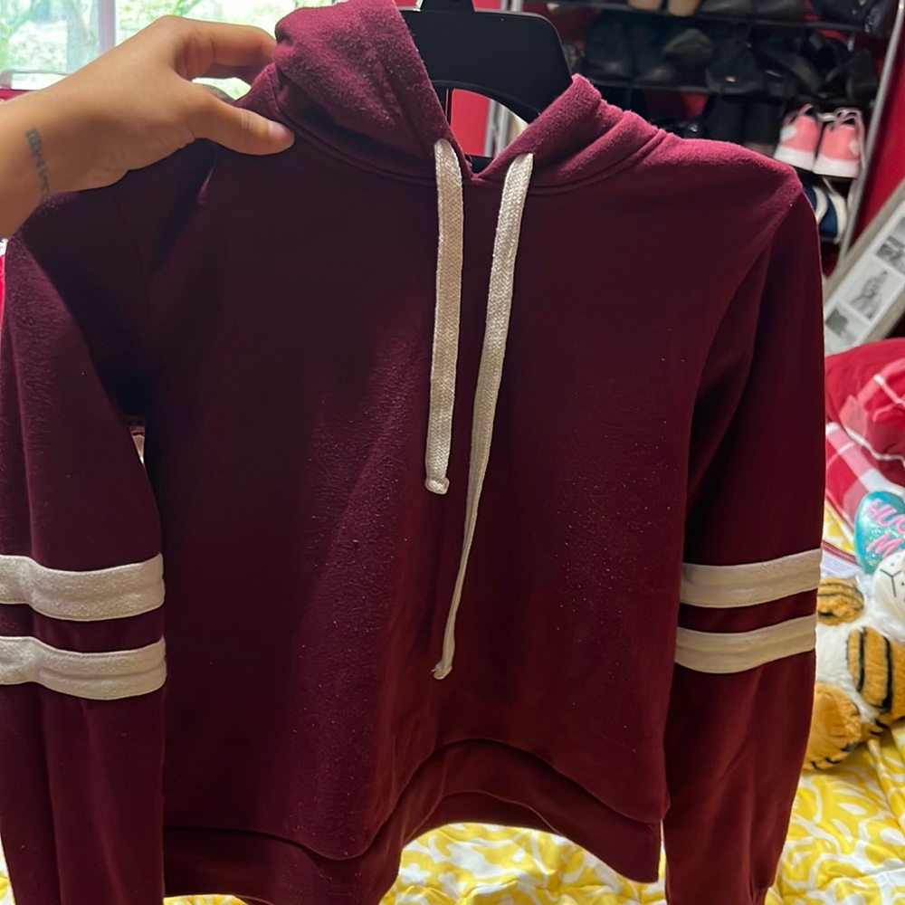 Short maroon sweatshirt